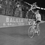 Italian Fiorenzo Magni is cheered on around Milan’s Viggorelli Velodrome after winning the 38th Giro 1955.